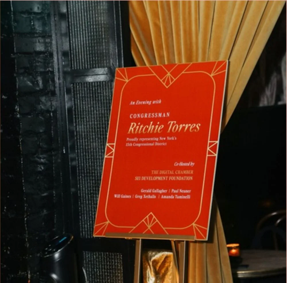 Invitation signage at a congressional campaign fundraiser