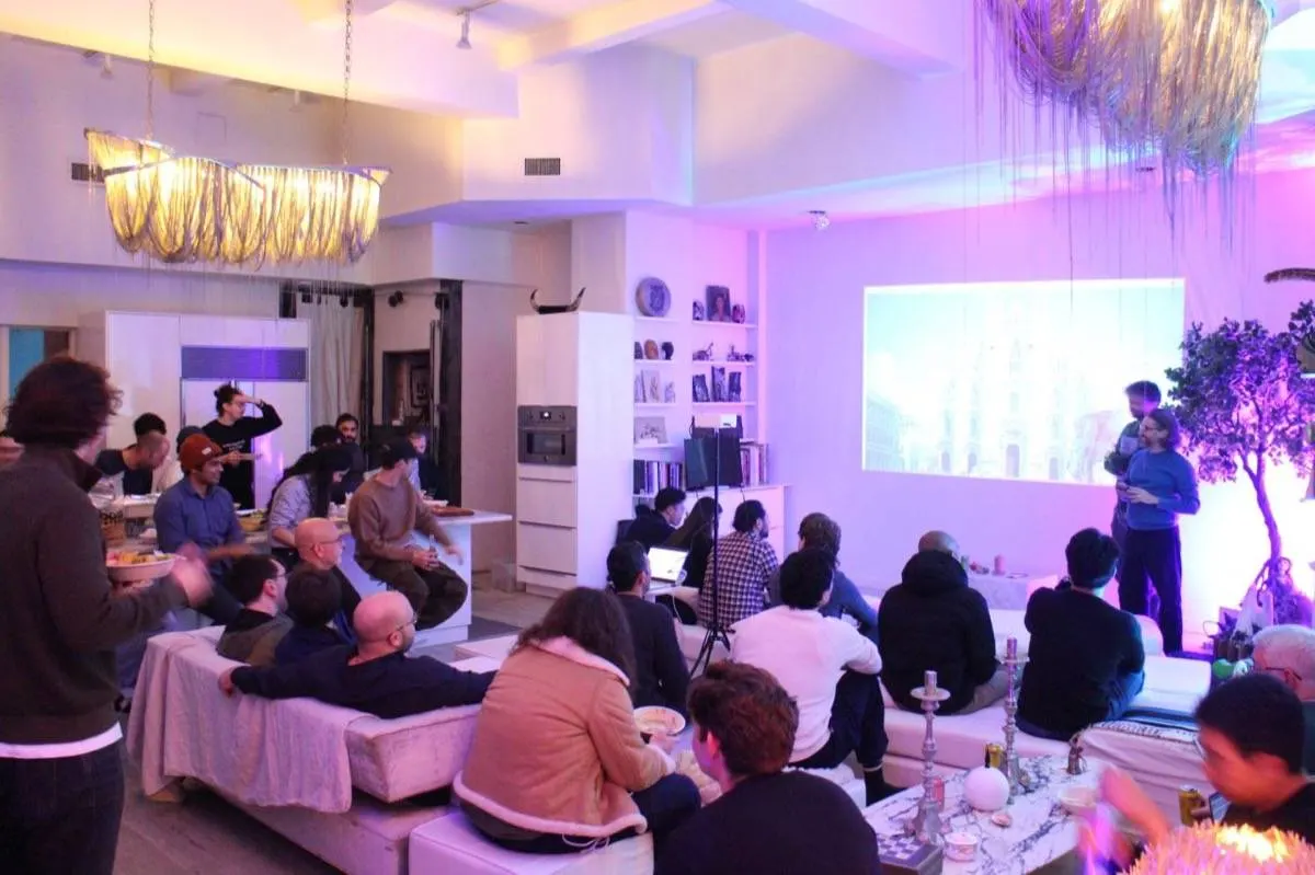 AI Socratic gathering in action, guests in discussion at an AF Theatricals event